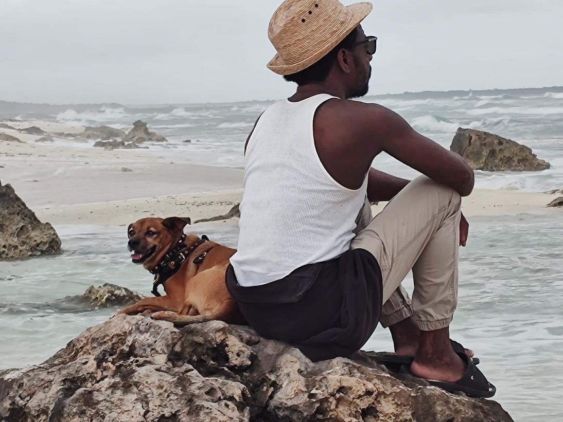 My husband Deevon Wes La Rue finding his Zen in a low-impact, nature-worshipping trip to the beach. Accompanied by Tito, the best dog in the world.