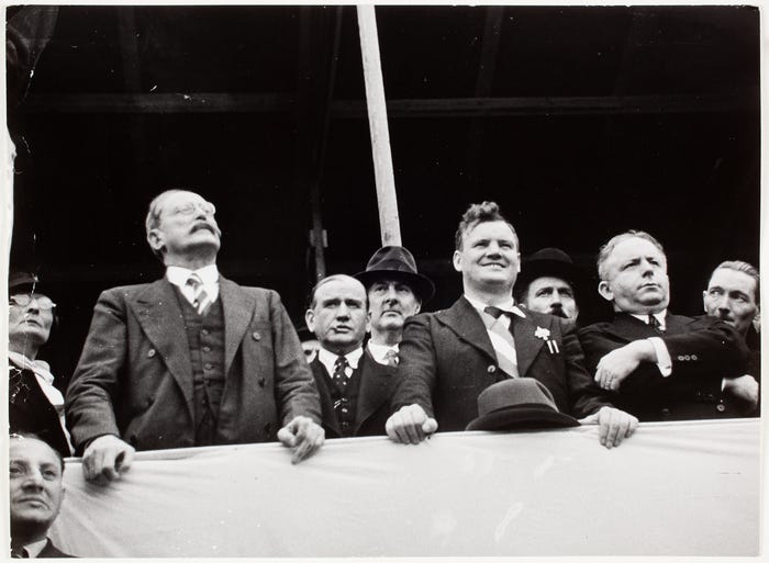 Leon Blum, Edouard Daladier, Maurice Thorez, and Roger Salengro on the  reviewing stand of the Bastille Day parade, Place de la Nation, Paris] |  International Center of Photography
