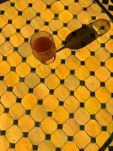 A series of six photos depicting food from Tuscany. Dishes include quiches, fresh fruits, tomatoes, a glass of wine, a pasta dish, and a female presenting person holding a plate of food. 