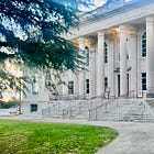 COURT REPORT: 'None, None' vs. County Commissioner Candidate