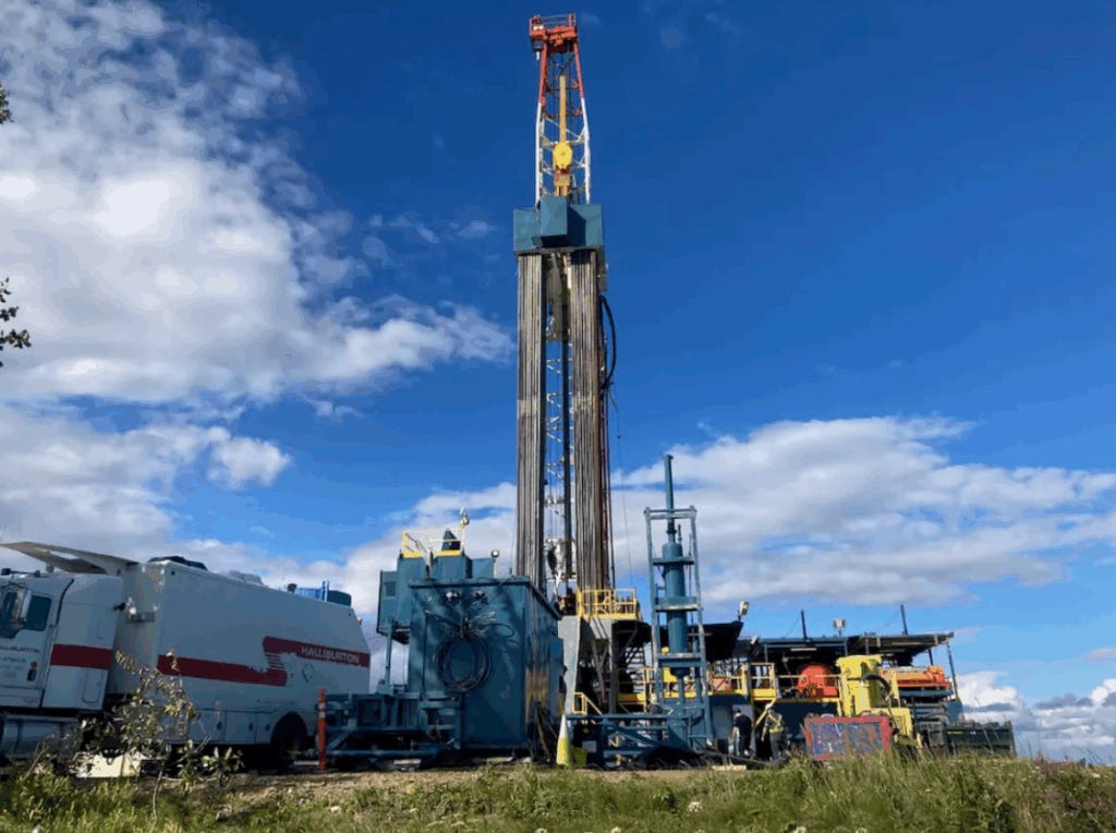 An oil and gas rig drills at a Hilcorp development in the Cook Inlet basin in Southcentral Alaska. (Nathaniel Herz/Northern Journal)