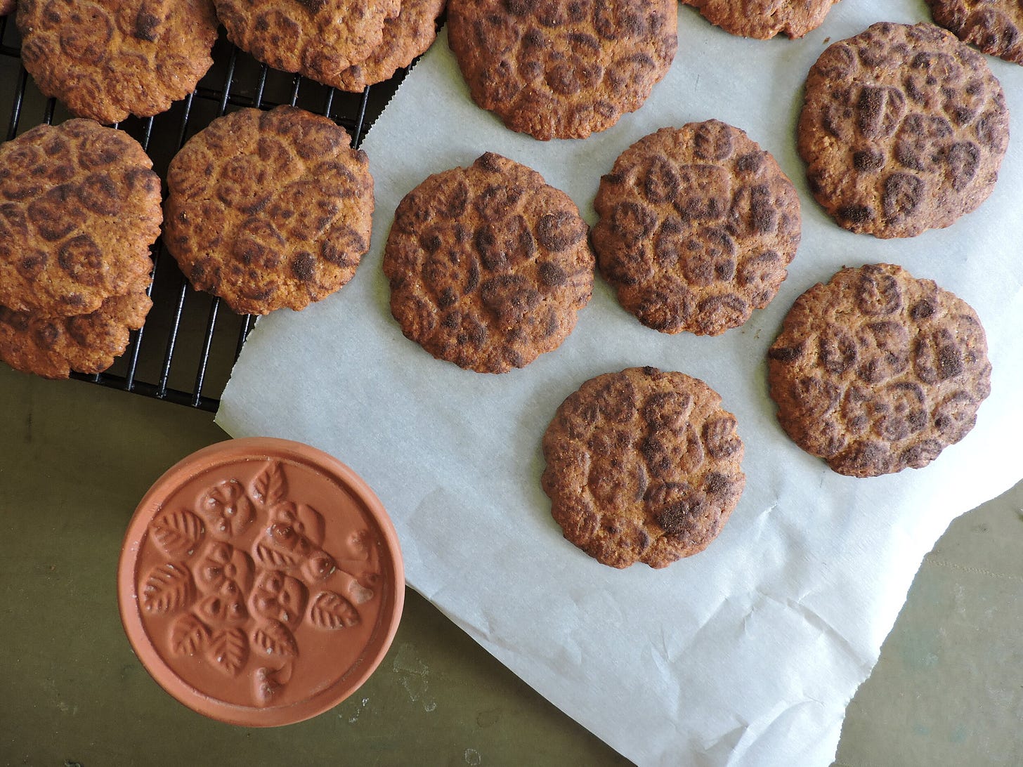  Cookies stamped using the cookie stamp pictured and cinnamon to keep from sticking. Pattern remains distinct, and they get the extra flavor boost! 