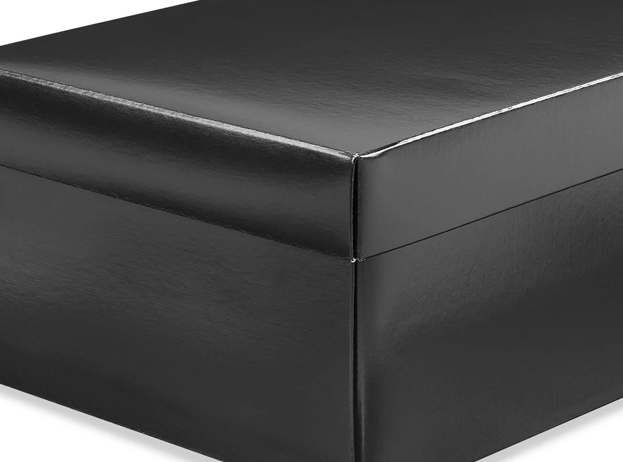 A black shoe box with lid, 3/4 view