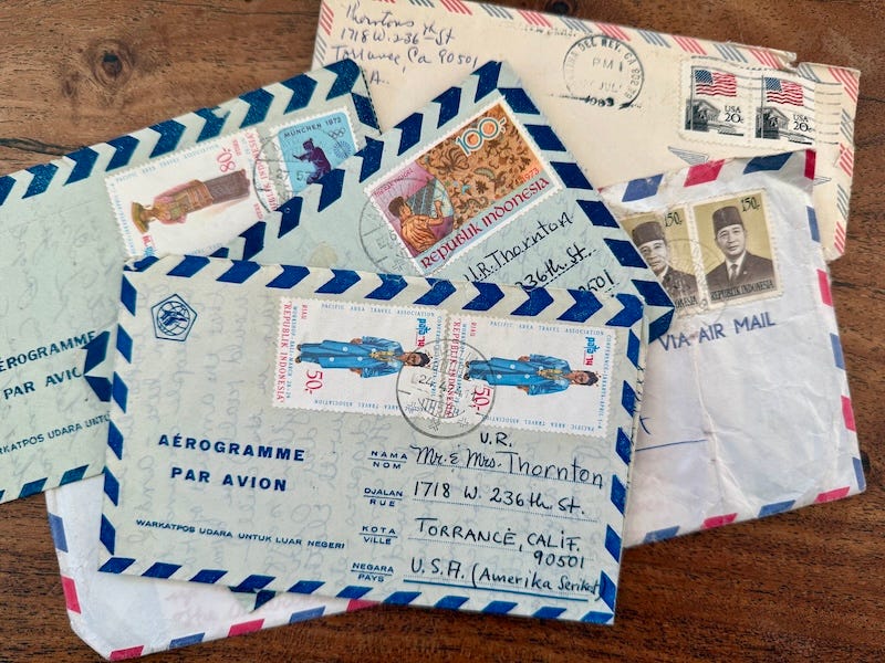 Stack of five addressed and stamp airmail envelopes