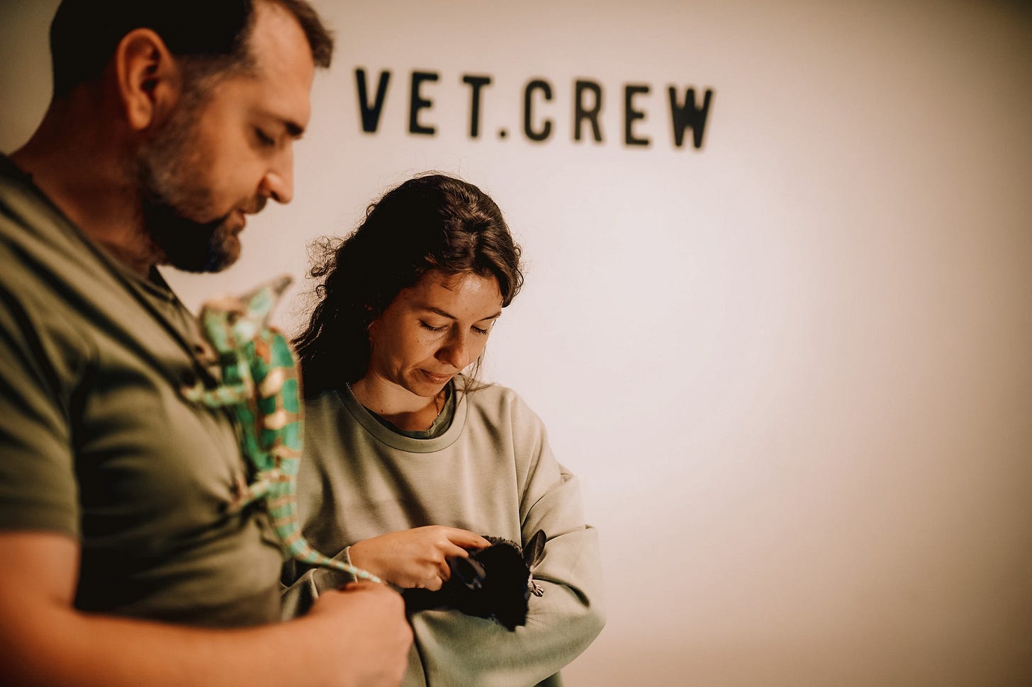 May be an image of 2 people and text that says 'VET.CREW'