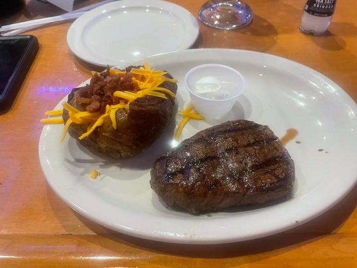 Photos of our tasty meals at the Texas Roadhouse. Filets, snake bite appetizer and a tasty margarita.