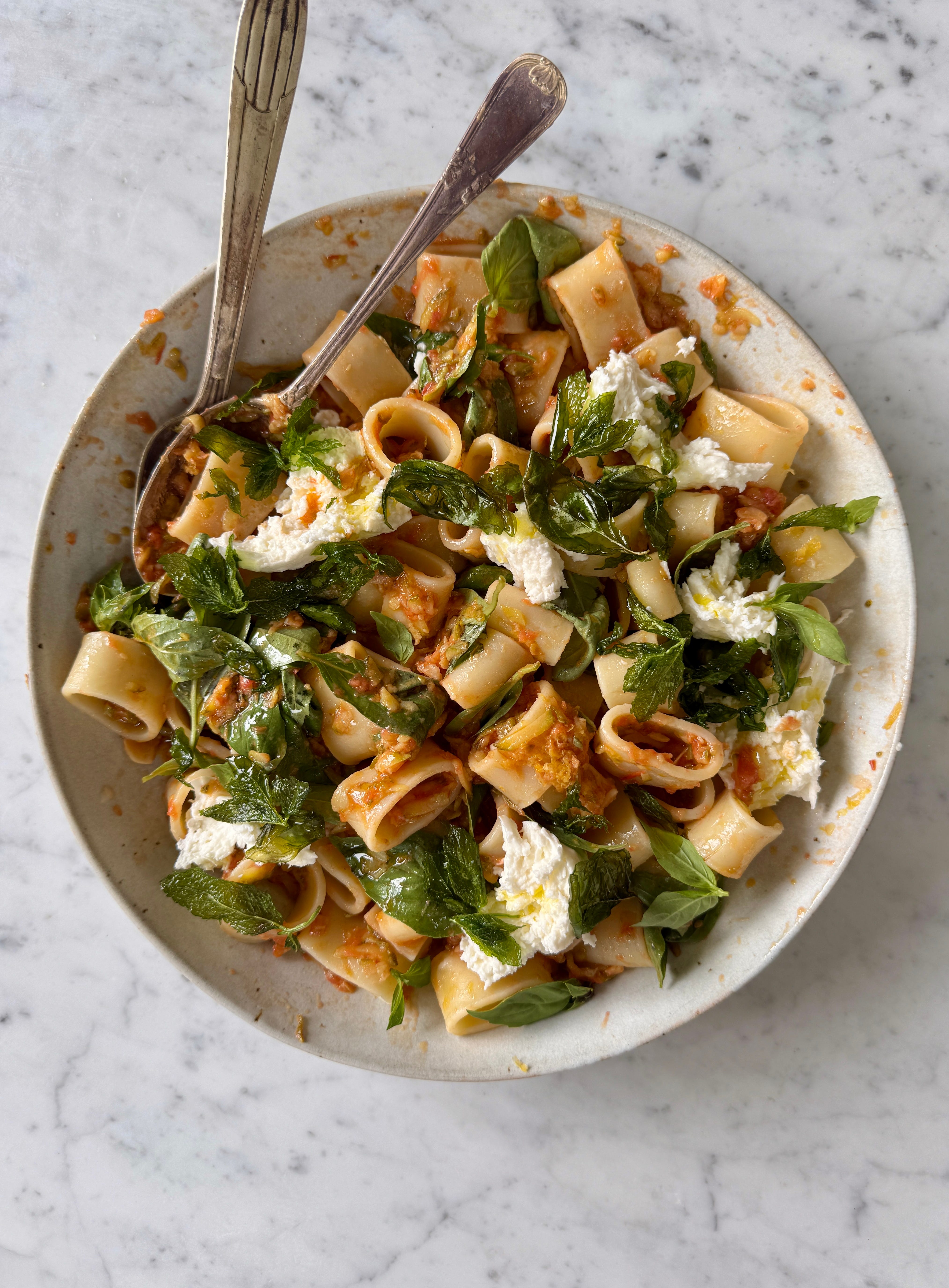 Summer holiday herby courgette and tomato pasta