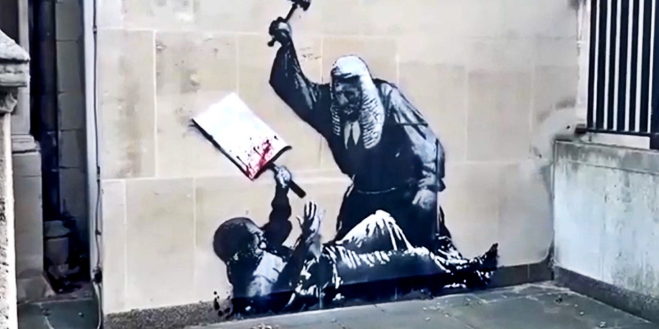 Putin vrea sa-l aresteze pe Banksy pentru un graffiti! Pardon, guvernul britanic vrea...