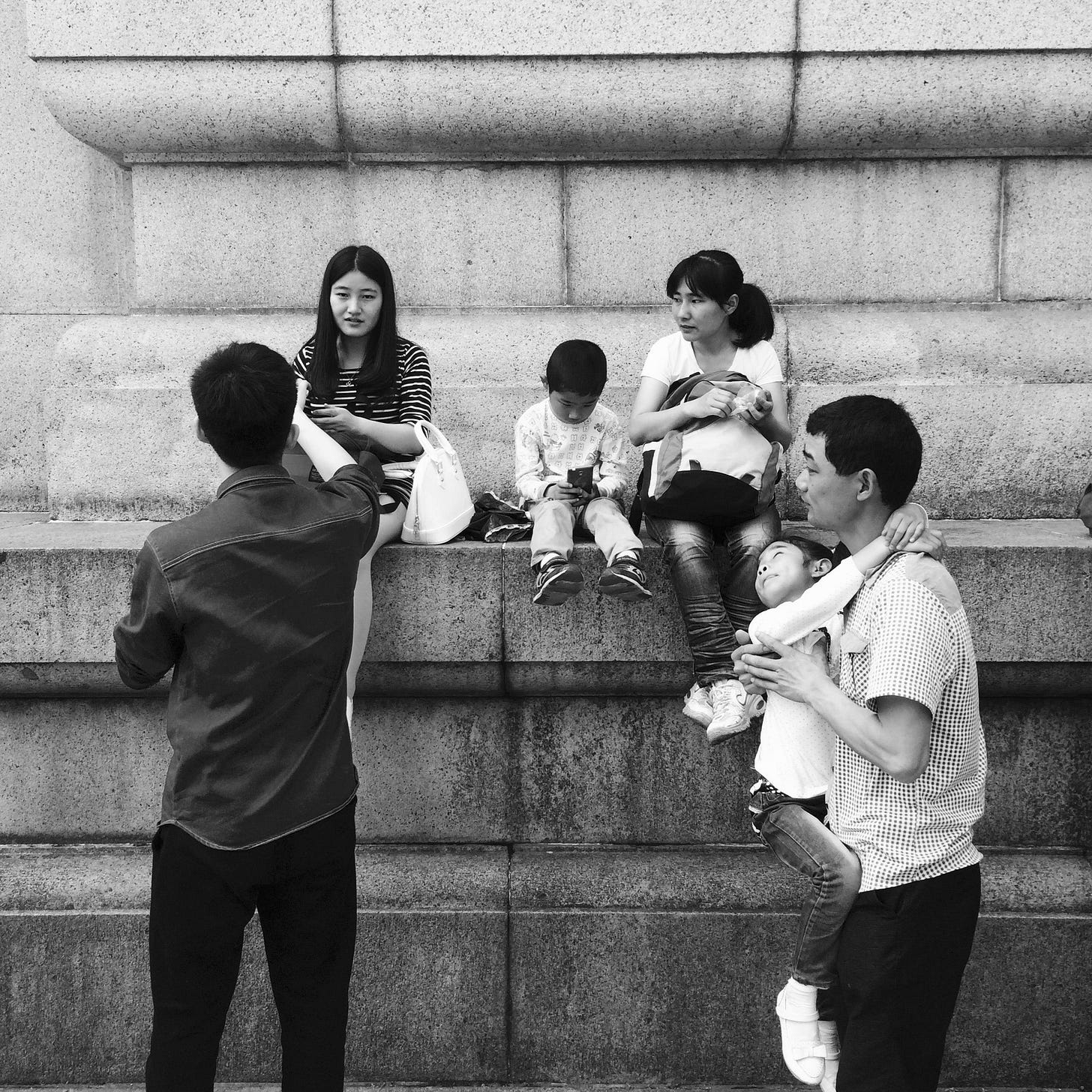 Visitors pause for a rest at Dr. Sun Yat-sen’s Mausoleum in Nanjing.
