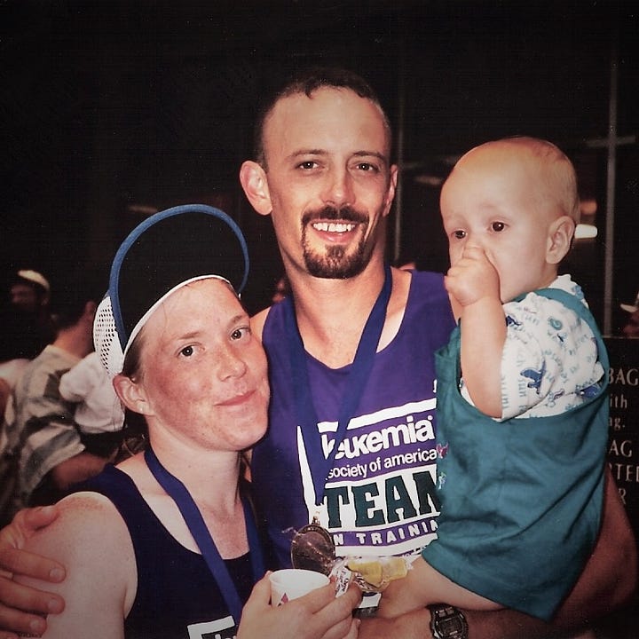 Renee, Lucas, and I after the race; my finisher's medal (hanging with other medals)