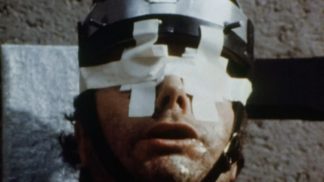 Faces of Death | Still features a simulated execution. Faces of Death | Still features a simulated execution.