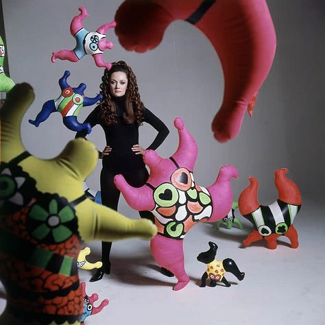 A series of photos depicting Niki de Saint Phalle's Nanas sculptures.