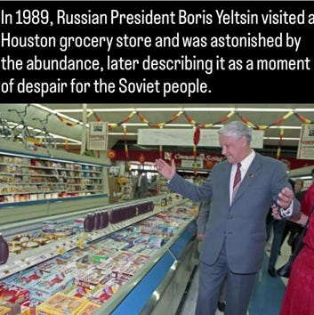 A person in a suit and tie standing next to a grocery store

AI-generated content may be incorrect.