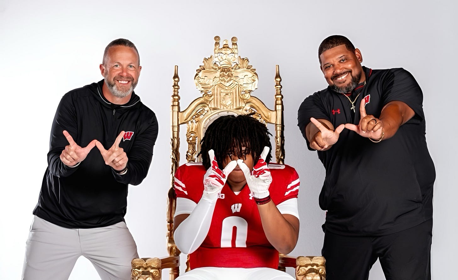 Wisconsin commit Yahzeen Zion poses with Badgers assistant coaches Matt Mitchell and E.J. Whitlow Wisconsin commit Yahzeen Zion poses with Badgers assistant coaches Matt Mitchell and E.J. Whitlow