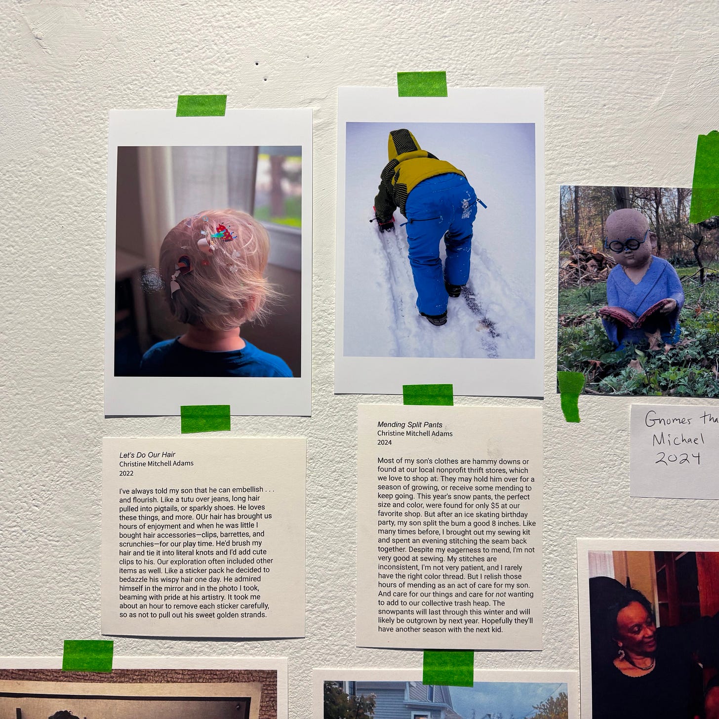 Two of my photos printed and taped on a gallery wall.