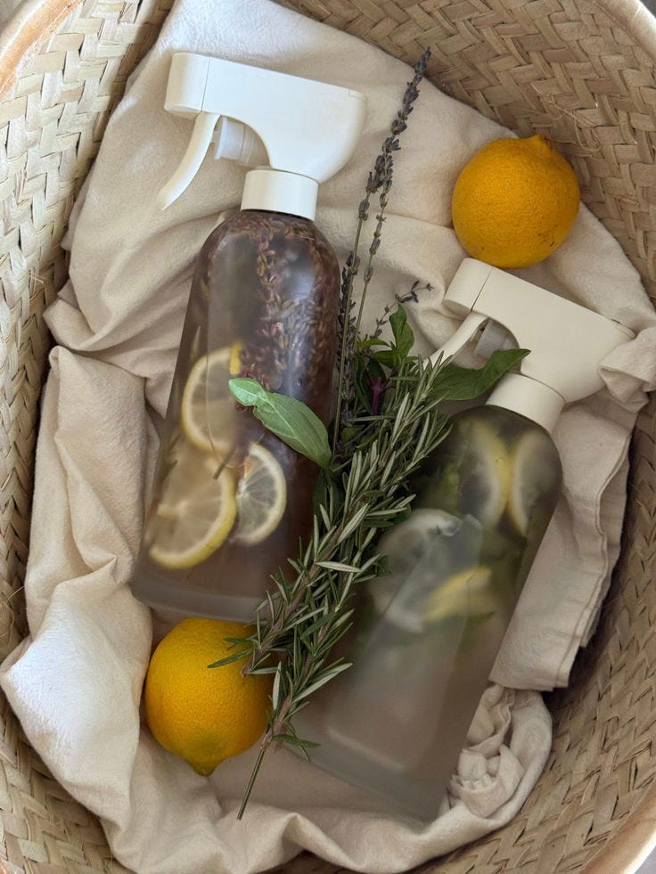 This may contain: a basket filled with lemons and bottles of liquid This may contain: a basket filled with lemons and bottles of liquid