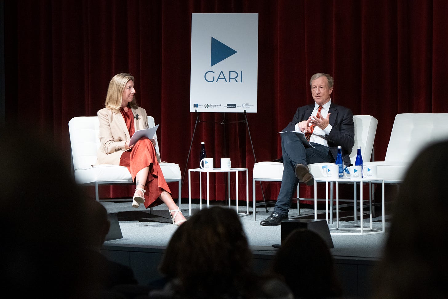 A stage photo featuring Molly Wood and investor, climate activist and former presidential candidate Tom Steyer. A stage photo featuring Molly Wood and investor, climate activist and former presidential candidate Tom Steyer.