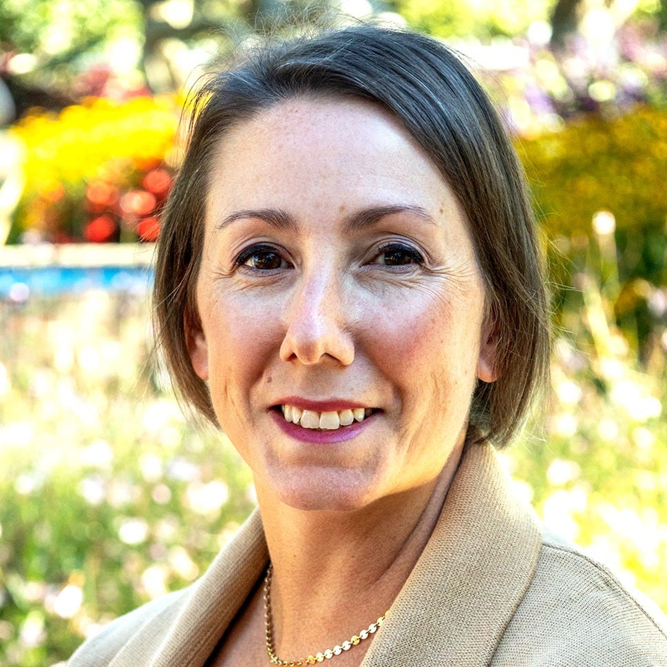 Gina Perry logo