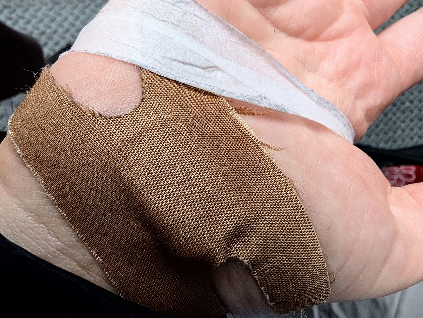 Close-up of a bandaged hand