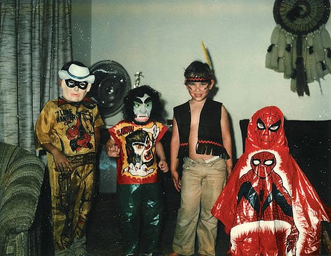 Old photographs of kids dressed in costumes for Halloween in the early 80's