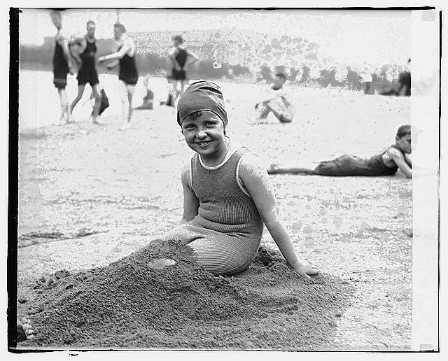 Betty Taylor, enjoying the childrens hour at the Washington Bathing beach. June 1923. Source: Library of Congress. 