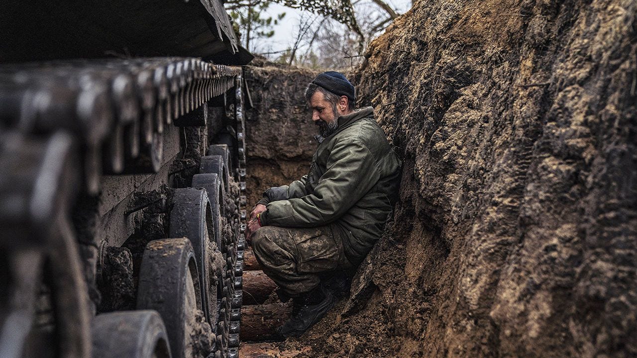 Ukrainian tank men prepare BWP infantry fighting vehicle for combat
