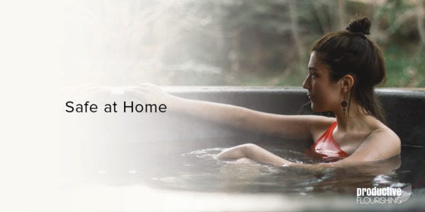 Woman sitting in a hot tub. Text overlay: Safe at Home Woman sitting in a hot tub. Text overlay: Safe at Home