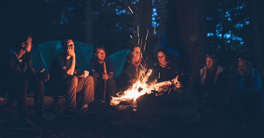 people having a bonfire