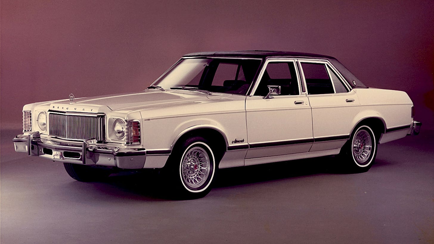 1977 Mercury Monarch painted white with a brown top and Ghia-trim wheels. 1977 Mercury Monarch painted white with a brown top and Ghia-trim wheels.
