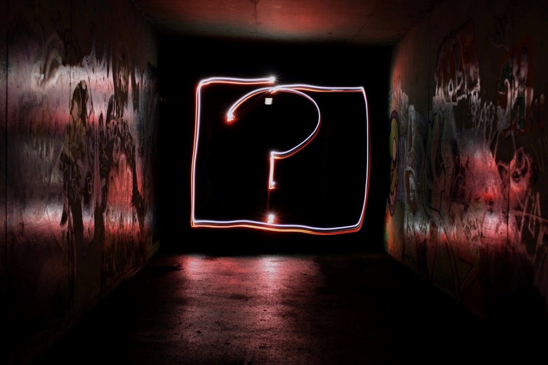 question mark neon signage question mark neon signage