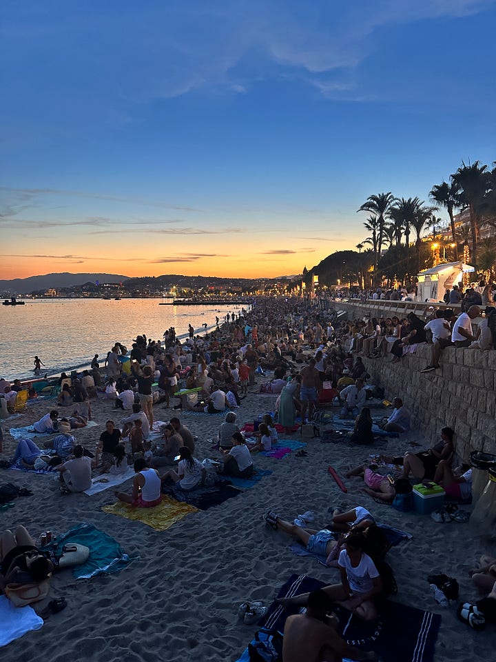 Two photos of France at night: one after the moon has risen over a garden, and one as the sun sets into the Mediterranean.