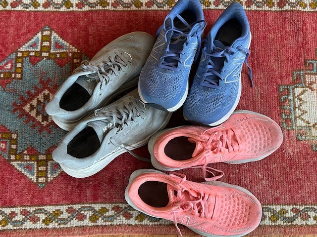 Multicolored sneakers on carpet