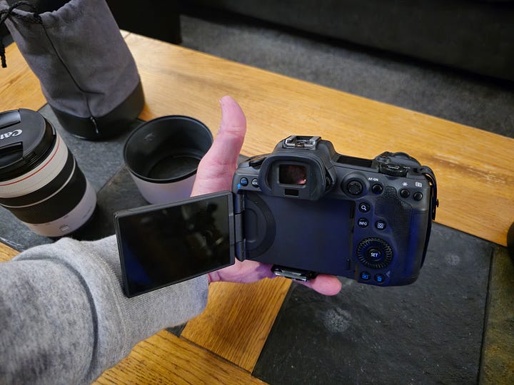 View of the R5 from the front, and from the back with display flipped open.