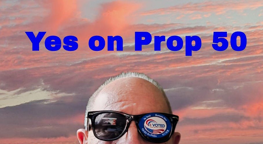 Yup, that's the author of this story, causing smears on a $12 pair of cool-guy shades with an I voted sticker against a background of the sky over LA.