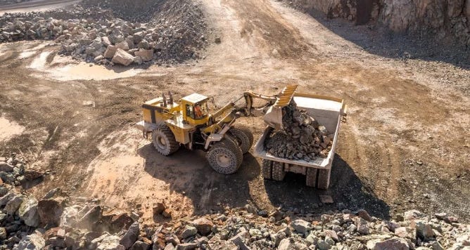 open-pit mining ore being loaded and hauled open-pit mining ore being loaded and hauled
