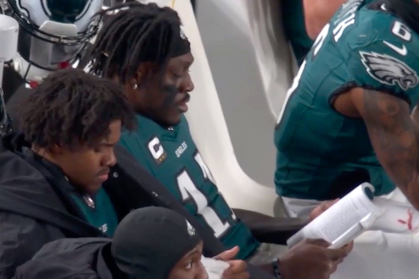 Eagles' AJ Brown Goes Viral for Reading on Sideline During Playoff Game