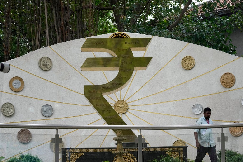 A symbol denoting India’s rupee is seen outside the central bank’s headquarters in Mumbai earlier this year. Photo: AP