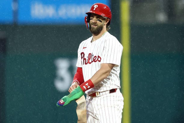 Bryce Harper of the Philadelphia Phillies reacts after hitting a single during the first inning against the San Francisco Giants at Citizens Bank...