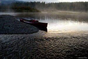 Canoe on Anutz Lake, near a stream inflow Canoe on Anutz Lake, near a stream inflow