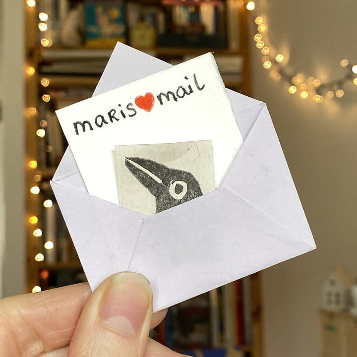 Tiny handmade envelope with stamp
