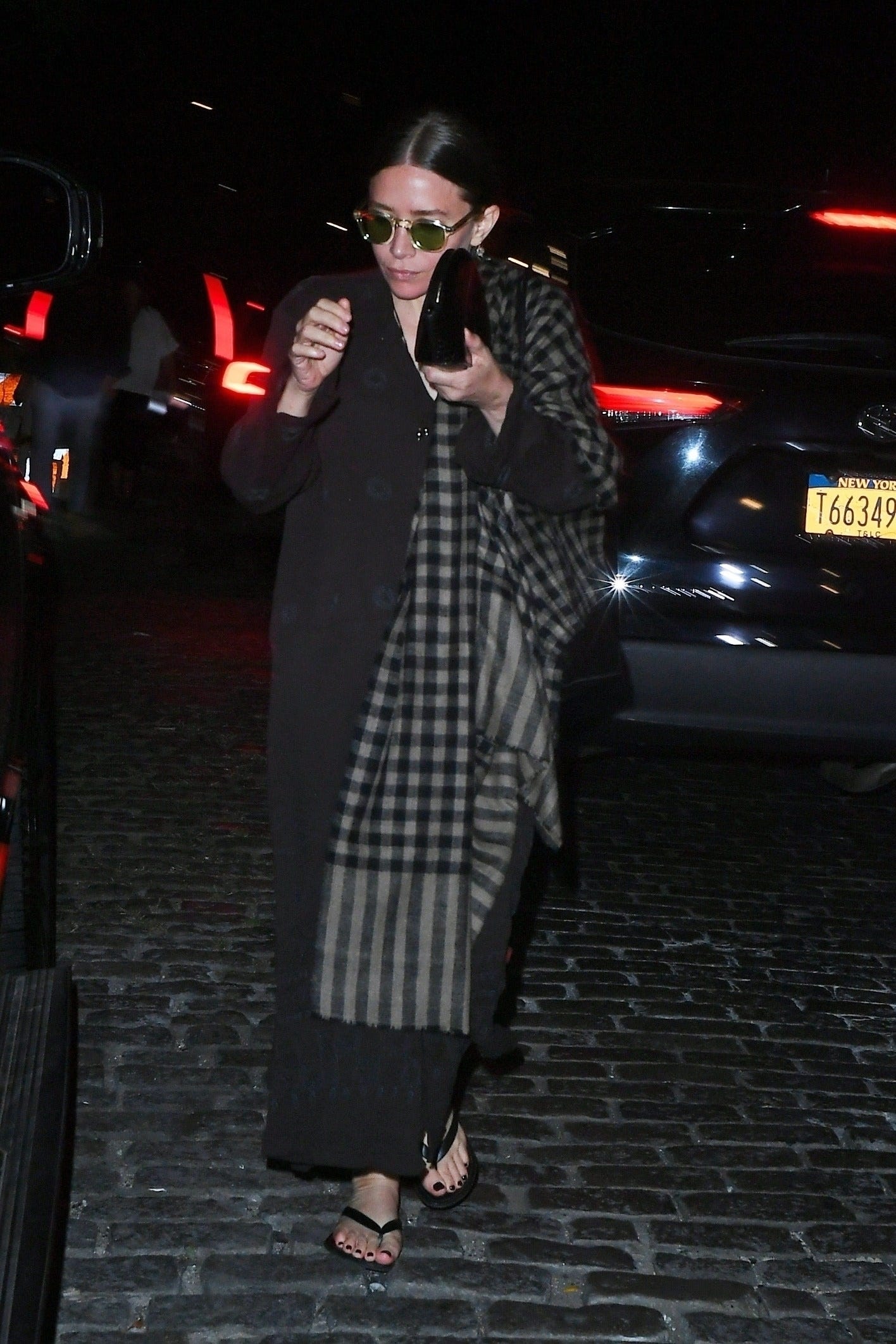 Ashley Olsen's Maxi Coat and $900 Flip-Flop Outfit Is As ...