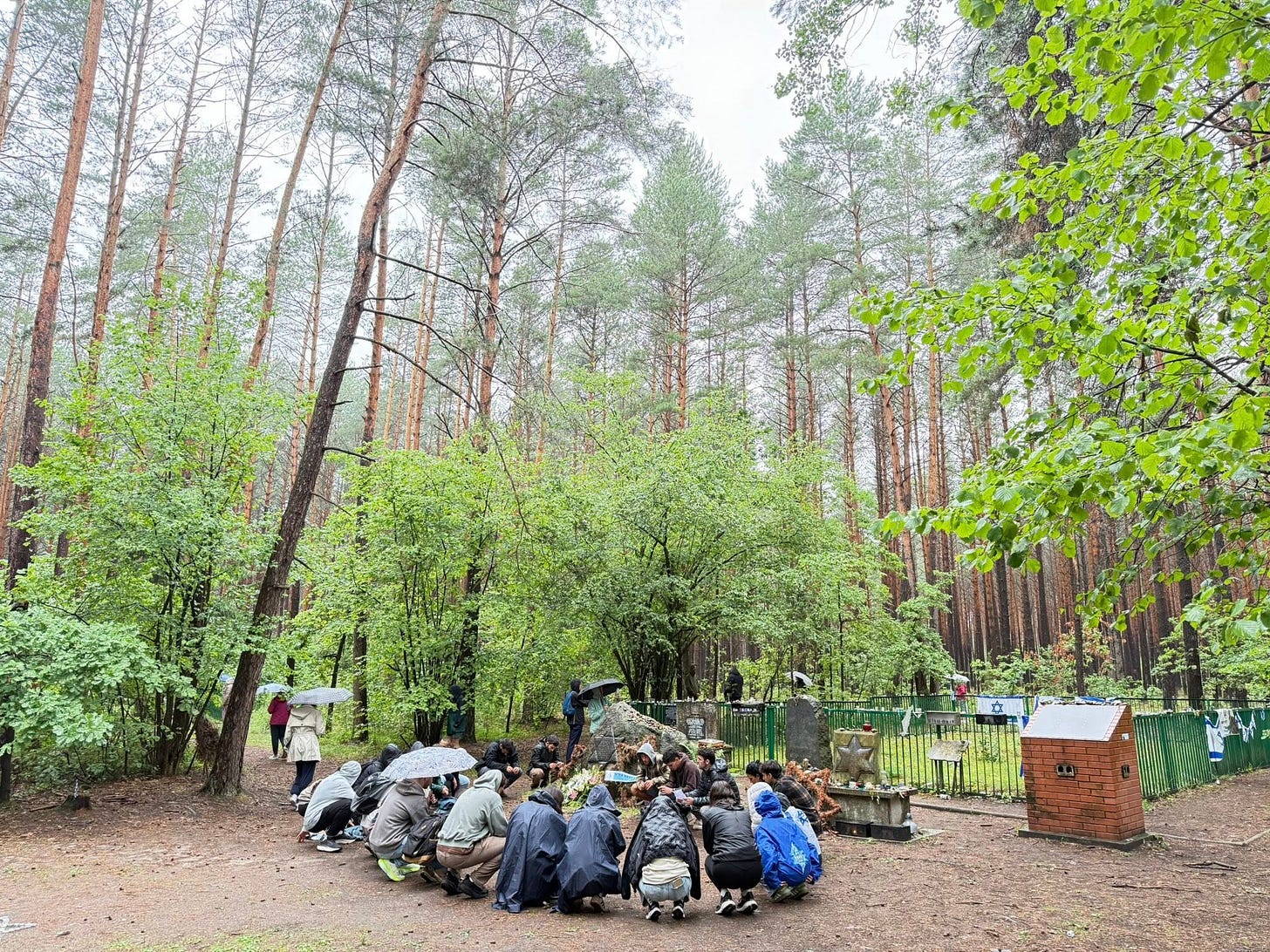 May be an image of 2 people and people camping