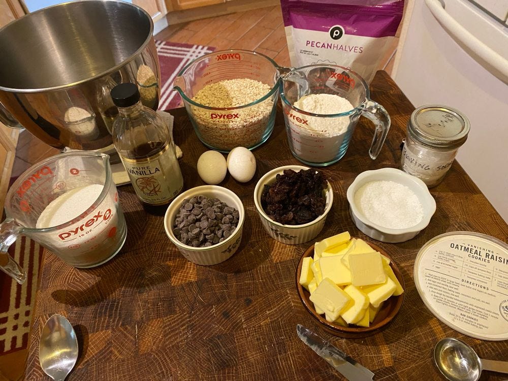 Oatmeal cookies ingredients. The brown and white sugar are in the same measuring cup. 