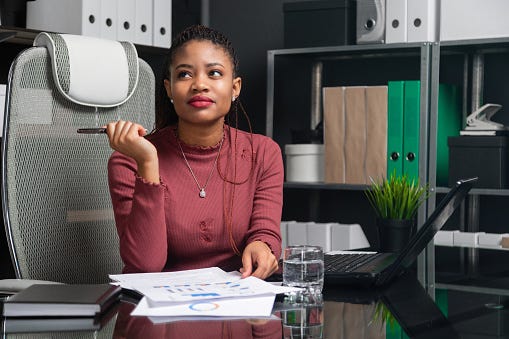 young woman holding a checklist