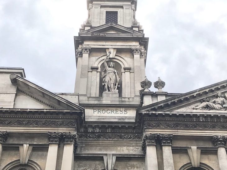 Exterior of Shoreditch Town Hall with the word 'progress' carved into the stone Exterior of Shoreditch Town Hall with the word 'progress' carved into the stone