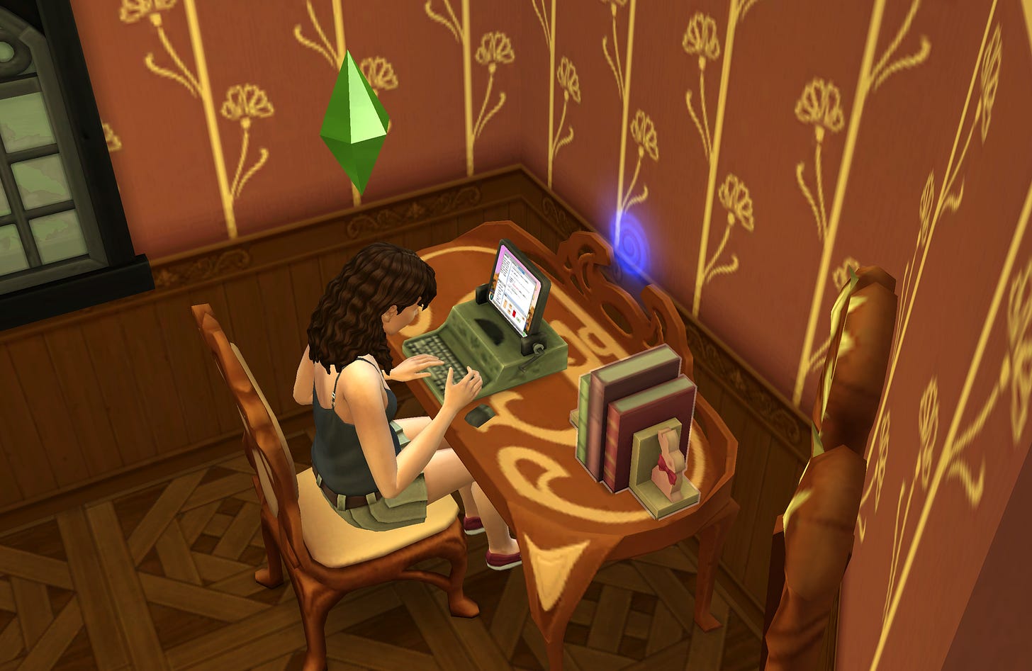Screenshot of the author, Anna, as a sims sitting at a desk typing on a computer.