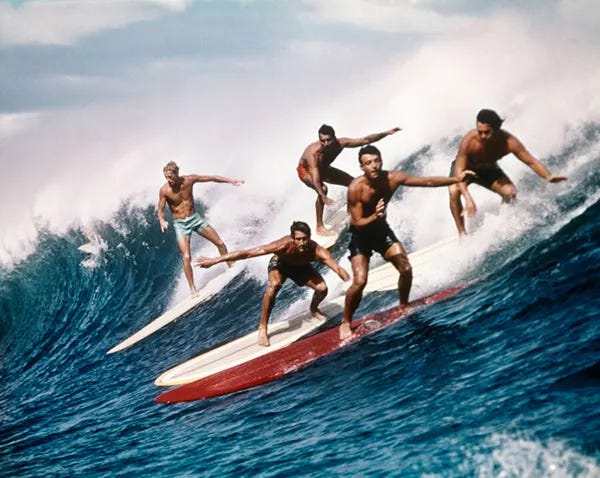 Six young women with their surfboards on a Southern California beach, circa late 1920s/early 1930s. Six young women with their surfboards on a Southern California beach, circa late 1920s/early 1930s.