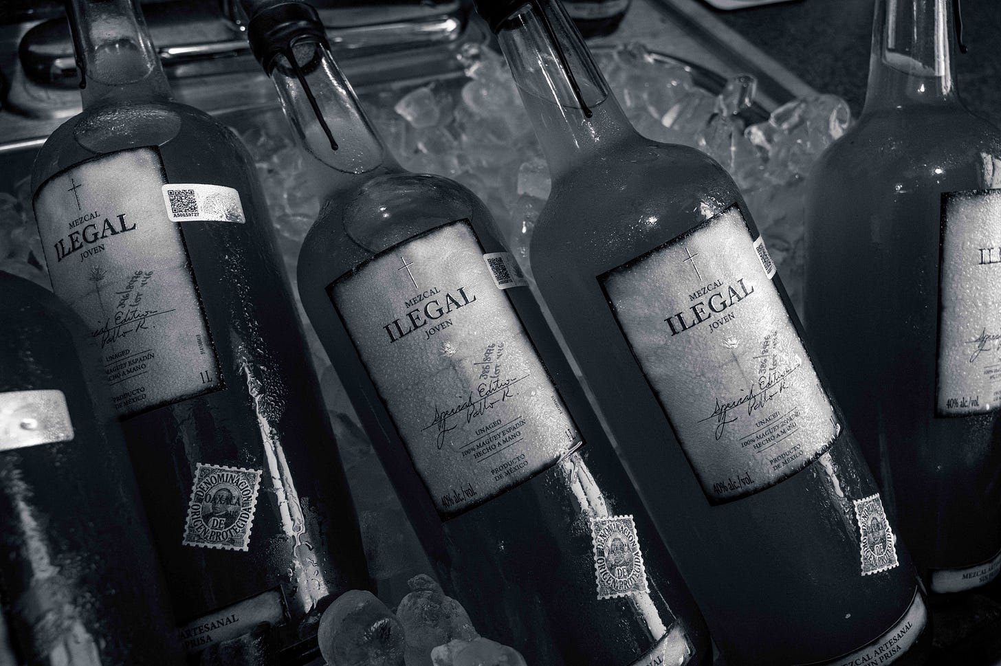 Black and White image of Ilegal Mezcal on ice