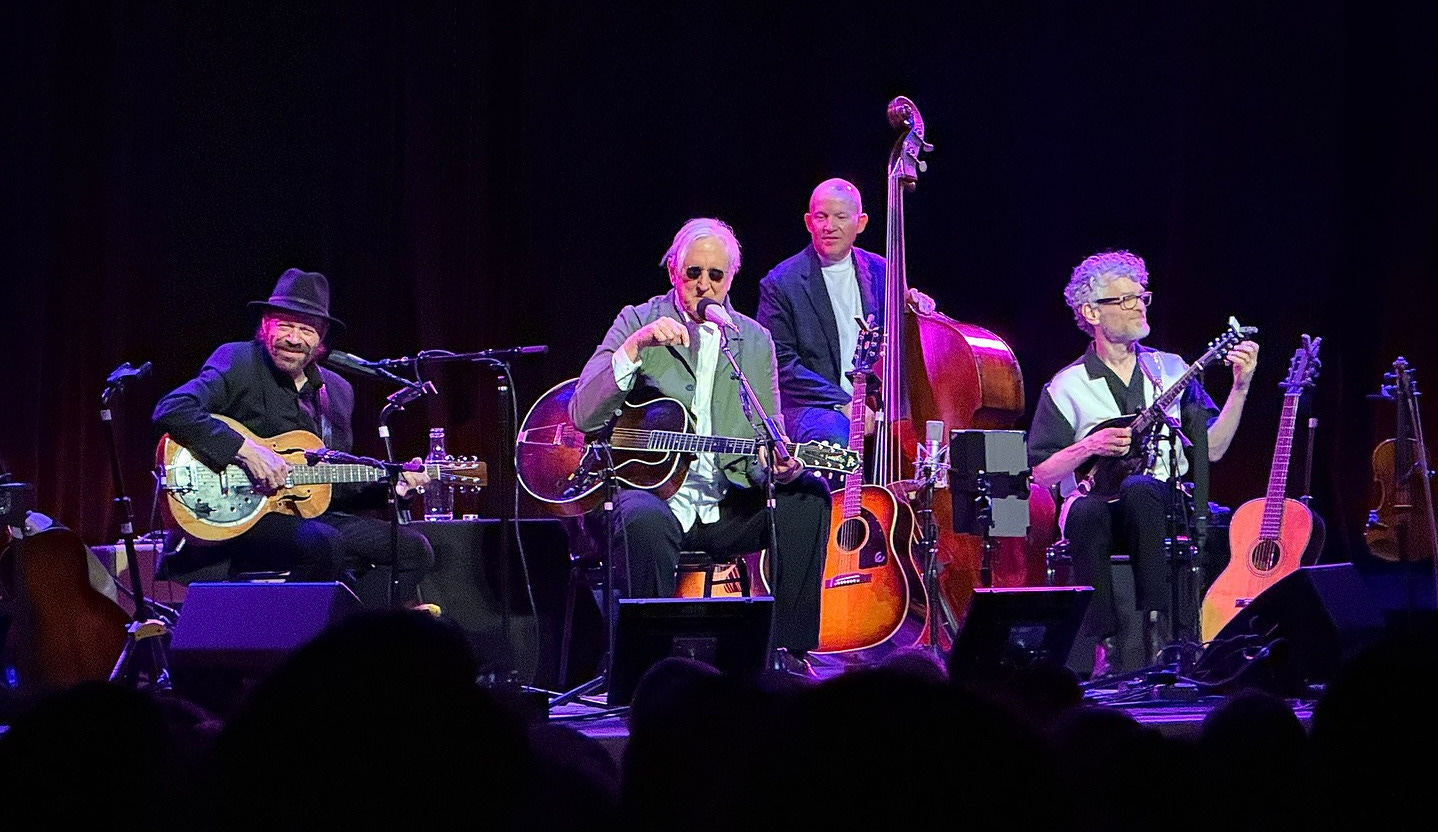 May be an image of 5 people, violin, accordion and guitar