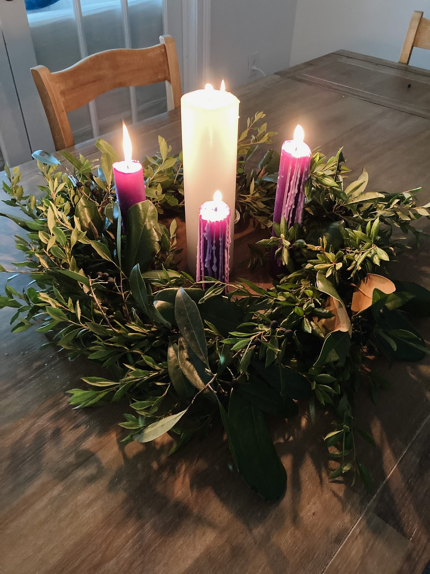 A close up of a lit Advent wreath A close up of a lit Advent wreath